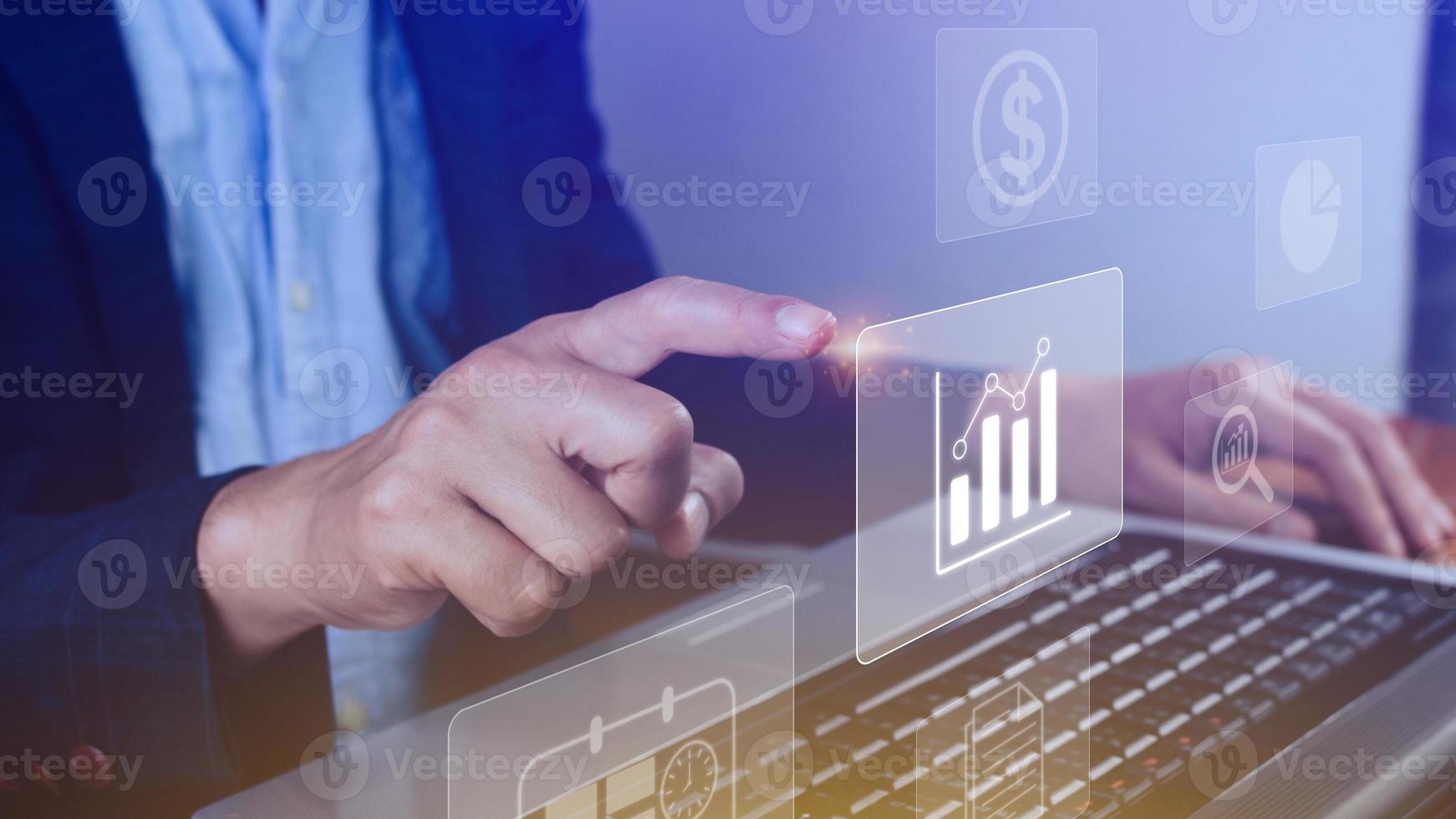 Big data analytics and business intelligence BI concept with chart and graph icons on digital screen interface and business people in the background. photo