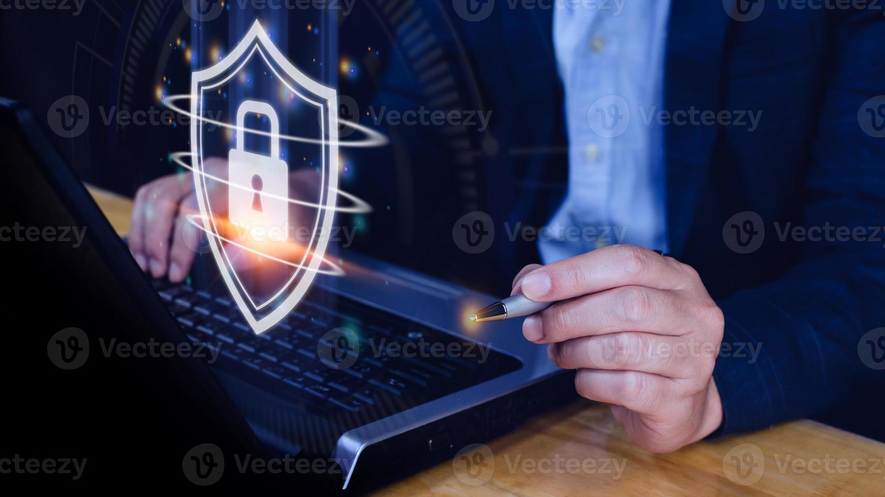 Computer network protection, secure and safe your data concept, businessman holding shield protection icon, Security shield Lock Security Businessman Protect Concept photo