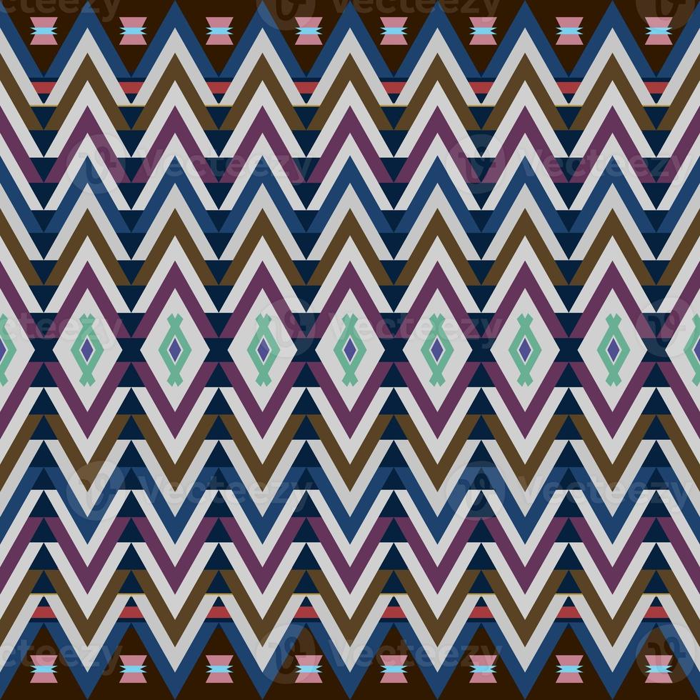 Ikat geometric folklore ornament. Tribal ethnic texture. Seamless striped pattern in Aztec style. Figure tribal embroidery. Indian, Scandinavian, Gyp sy, Mexican, folk pattern. Seamless pattern fab photo