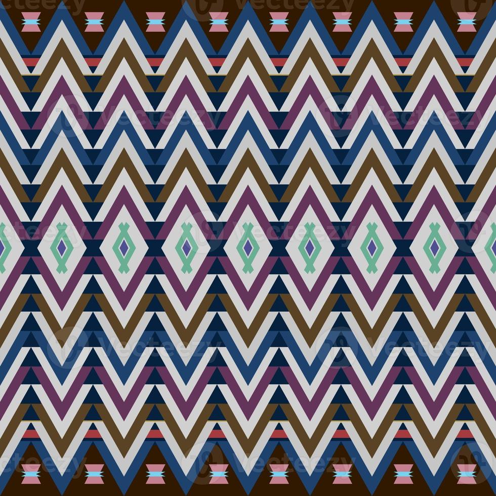 Ikat geometric folklore ornament. Tribal ethnic texture. Seamless striped pattern in Aztec style. Figure tribal embroidery. Indian, Scandinavian, Gyp sy, Mexican, folk pattern. Seamless pattern fab photo