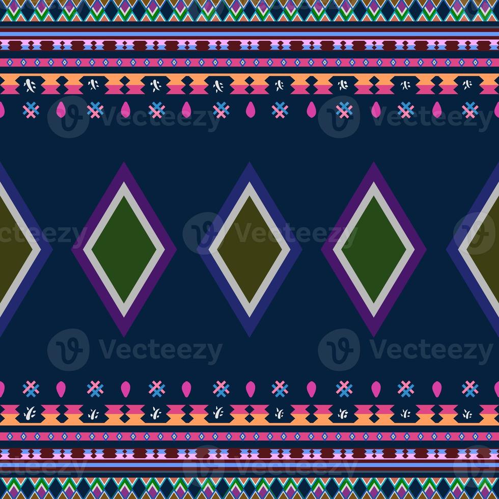 Ikat geometric folklore ornament. Tribal ethnic texture. Seamless striped pattern in Aztec style. Figure tribal embroidery. Indian, Scandinavian, Gyp sy, Mexican, folk pattern. Seamless pattern fab photo