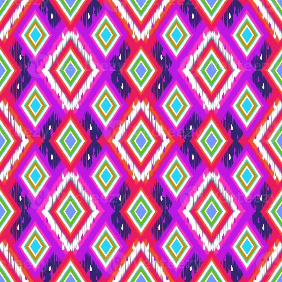 Ikat geometric folklore ornament. Tribal ethnic texture. Seamless striped pattern in Aztec style. Figure tribal embroidery. Indian, Scandinavian, Gyp sy, Mexican, folk pattern. Seamless pattern fabric photo