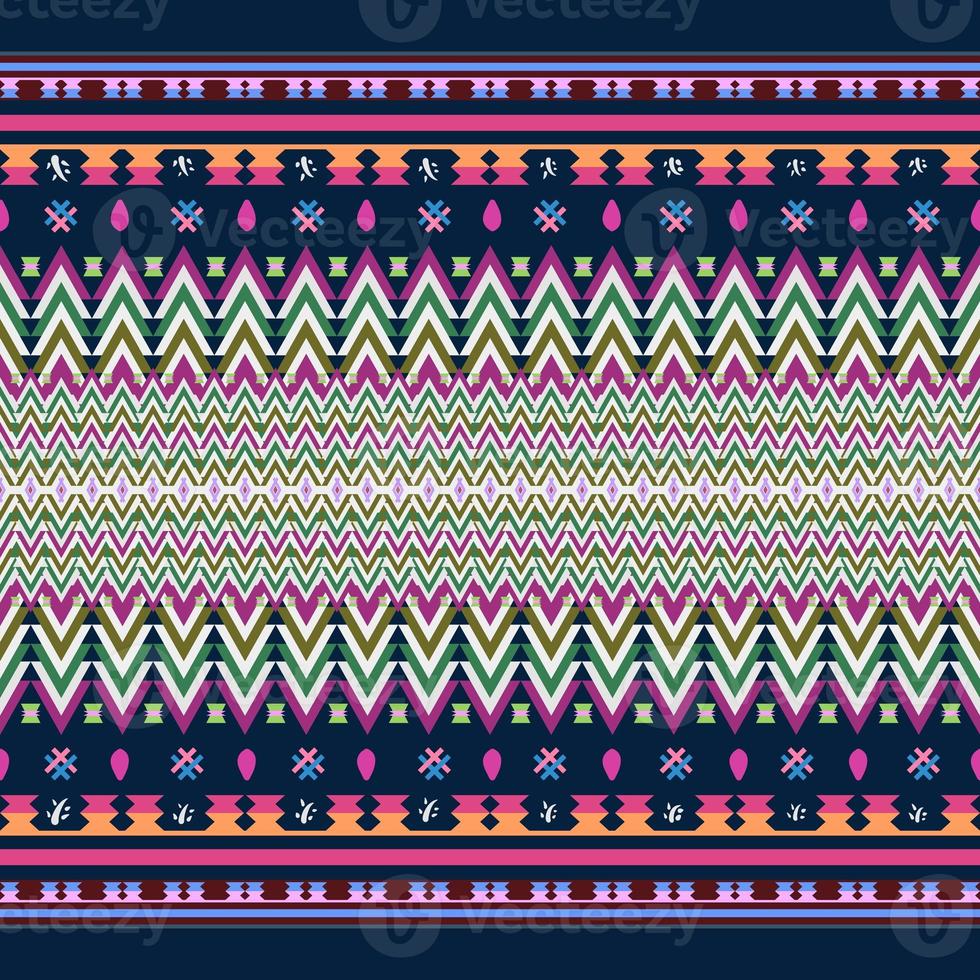 Ikat geometric folklore ornament. Tribal ethnic texture. Seamless striped pattern in Aztec style. Figure tribal embroidery. Indian, Scandinavian, Gyp sy, Mexican, folk pattern. Seamless pattern fab photo