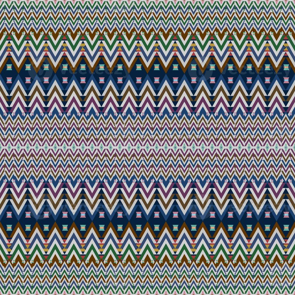 Ikat geometric folklore ornament. Tribal ethnic texture. Seamless striped pattern in Aztec style. Figure tribal embroidery. Indian, Scandinavian, Gyp sy, Mexican, folk pattern. Seamless pattern fab photo