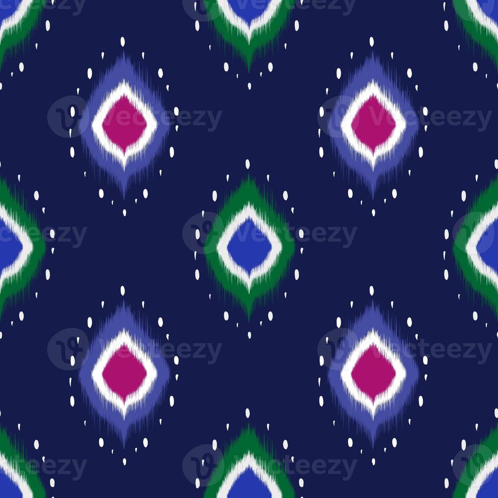 Ikat geometric folklore ornament. Tribal ethnic texture. Seamless striped pattern in Aztec style. Figure tribal embroidery. Indian, Scandinavian, Gyp sy, Mexican, folk pattern. Seamless pattern fabric photo