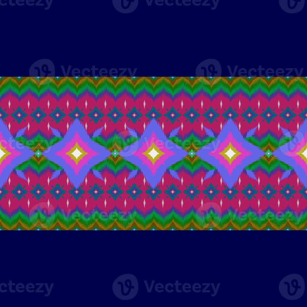 Ikat geometric folklore ornament, Tribal ethnic texture. Seamless striped pattern in Aztec style, Figure tribal embroidery, Scandinavian, Ikat pattern photo