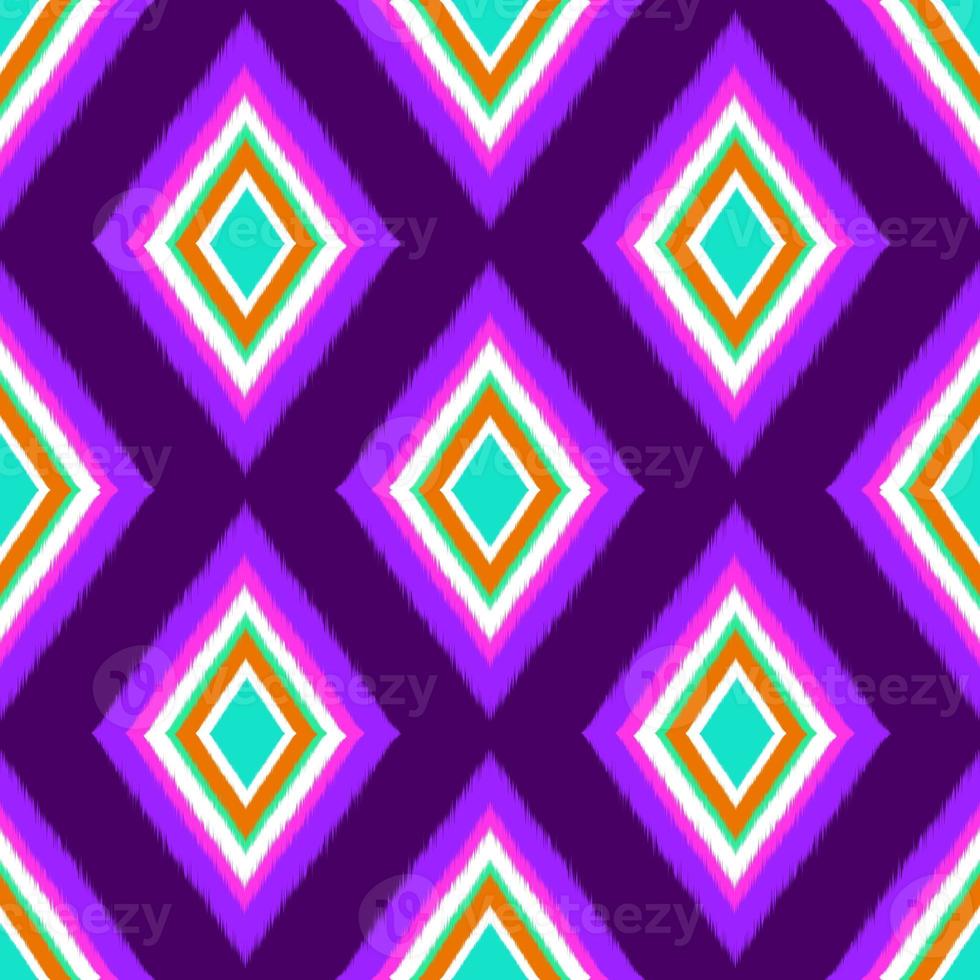 Ikat geometric folklore ornament. Tribal ethnic texture. Seamless striped pattern in Aztec style. Figure tribal embroidery. Indian, Scandinavian, Gyp sy, Mexican, folk pattern.Seamless pattern fabric photo