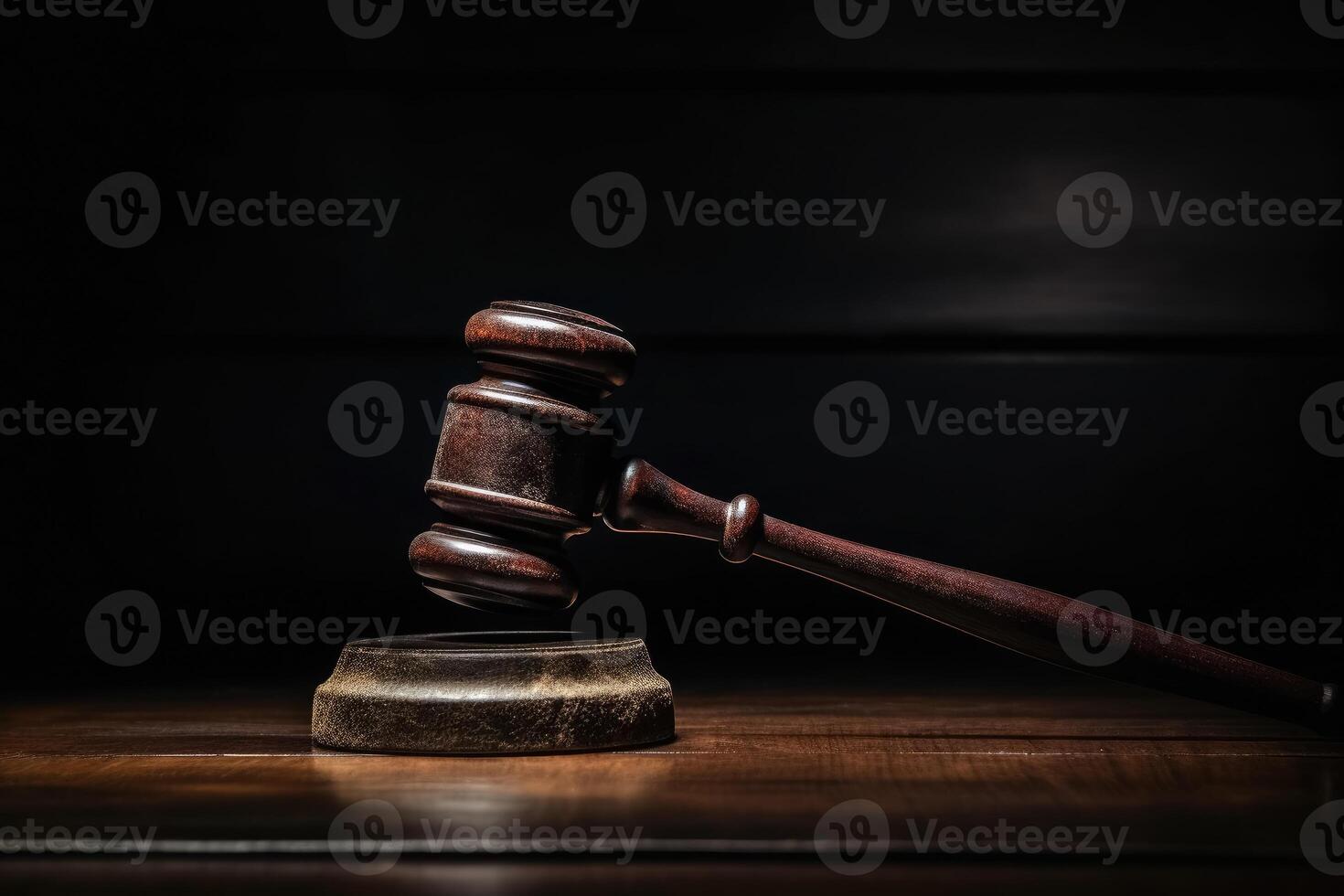 A judge hammer on an old desk top created with technology. photo