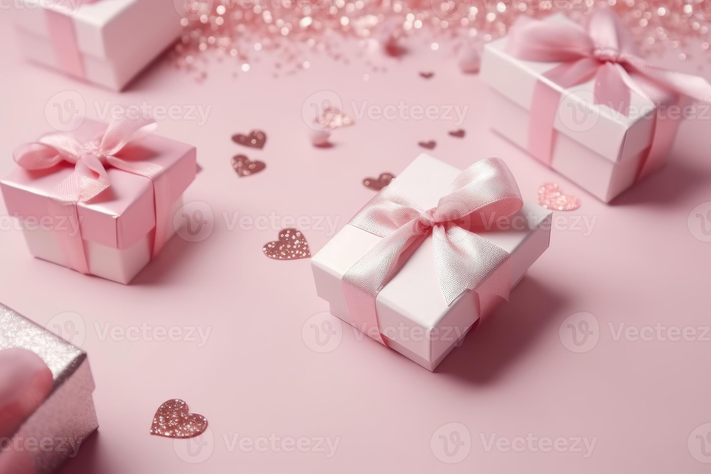 Top view photo of pink gift boxes with pink bow on isolated pastel pink ...