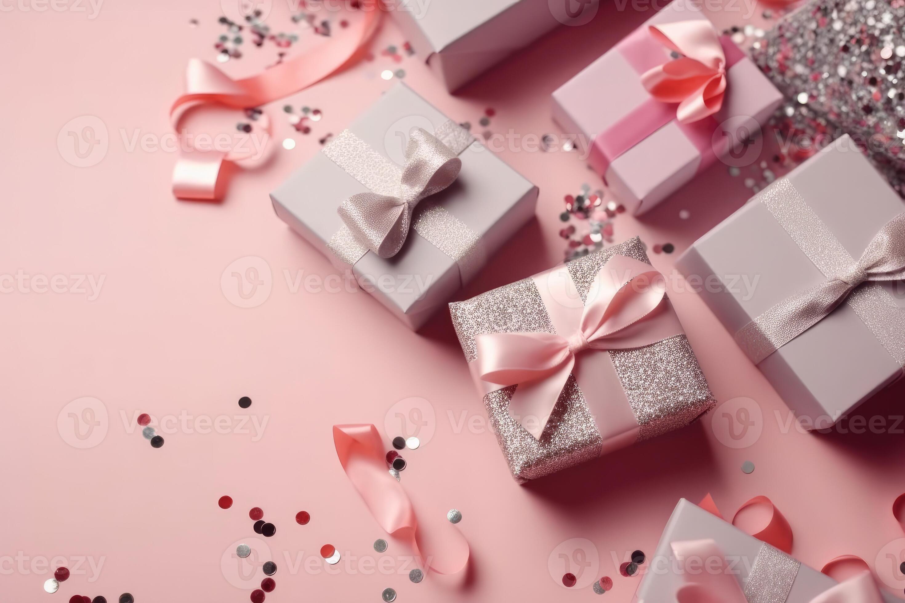 Top view photo of pink gift boxes with pink bow on isolated pastel pink ...