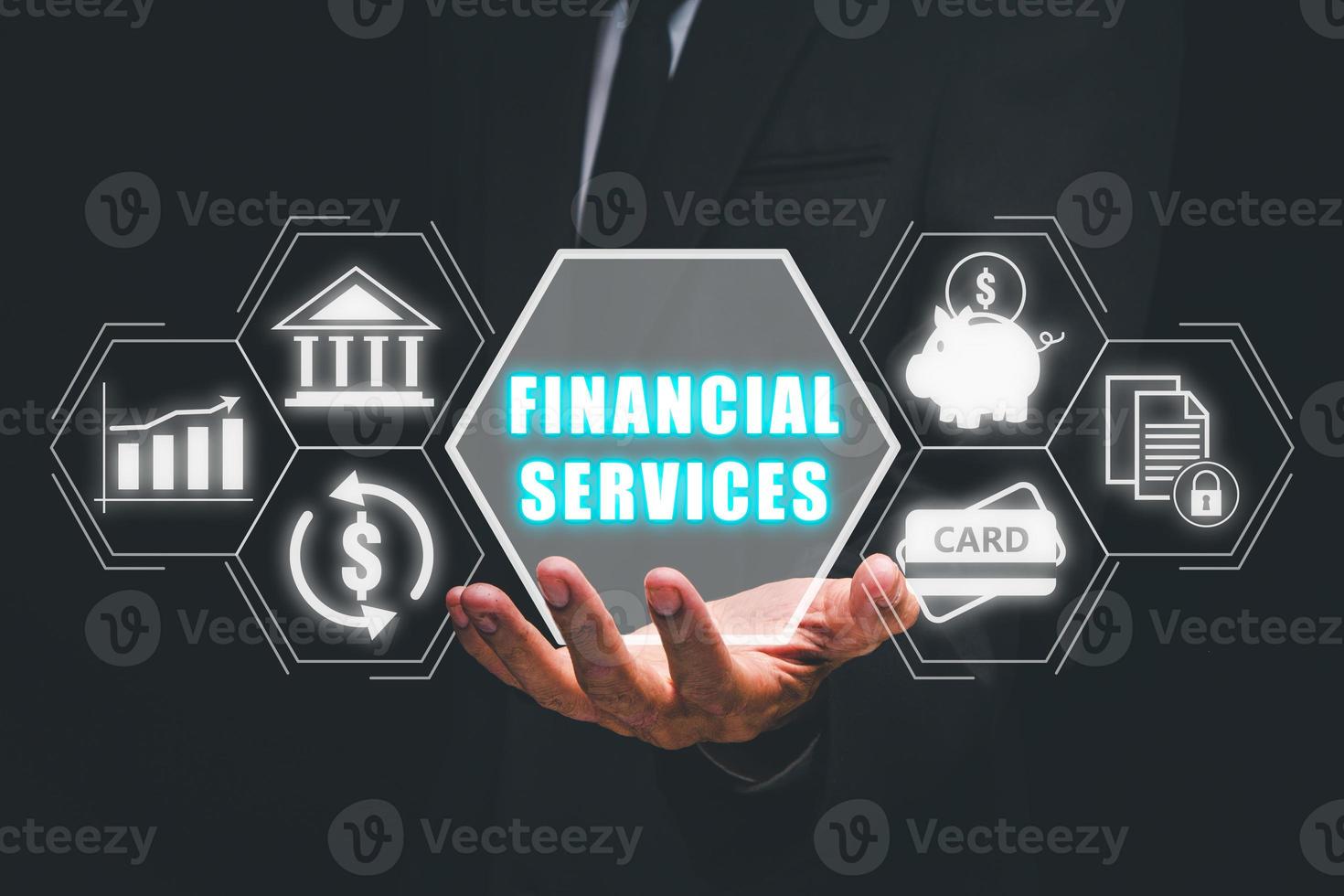 Business Finance, accounting, Businessman hand holding financial service icon on virtual screen. photo