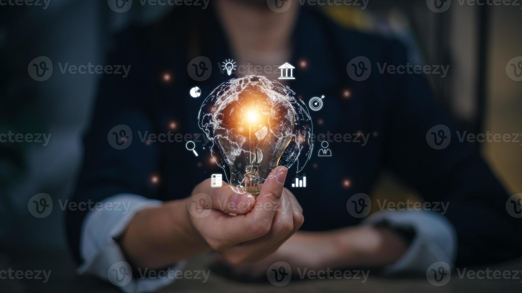 Business global internet connection application technology and digital marketing, finance, and banking, Digital link tech, big data. Hand holding Light bulb Global Internet connection. photo