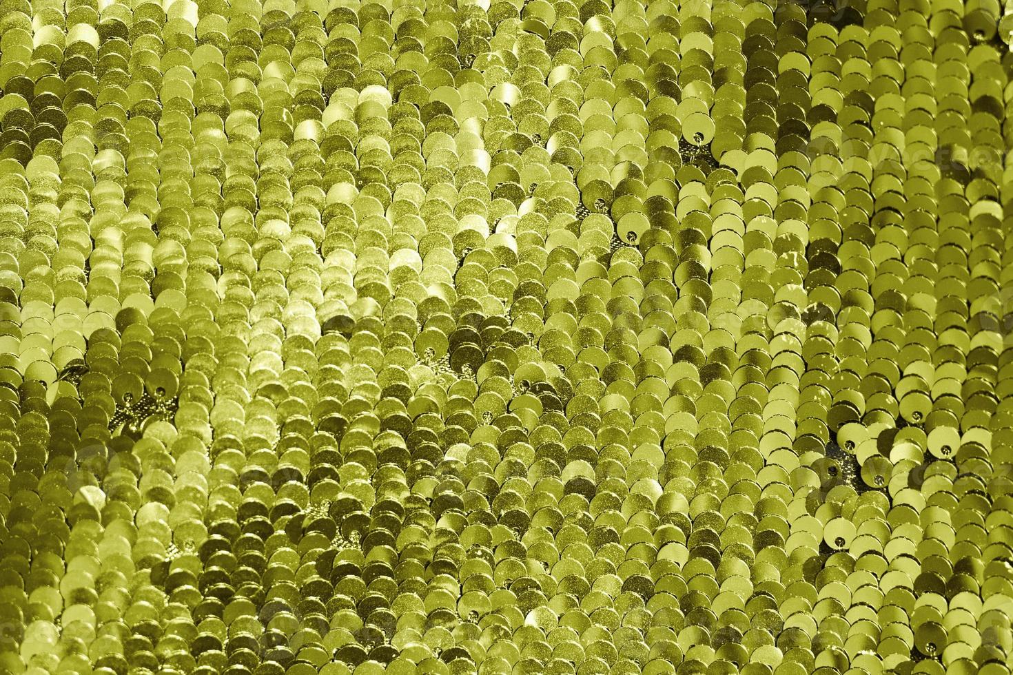 background of gold sequins. shiny sparkling background photo