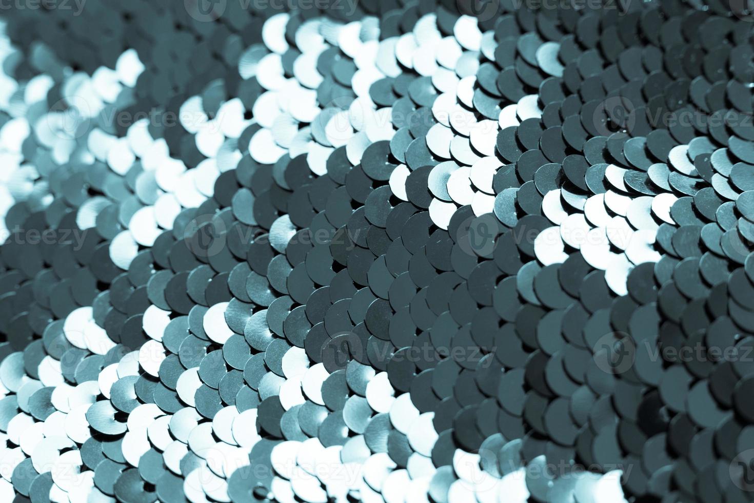 background of blue sequins. shiny sparkling background photo