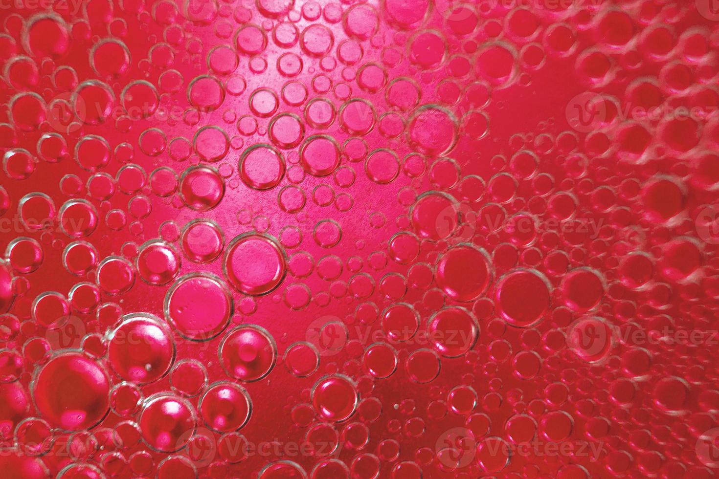 abstract light blue background with oil circles . bubbles of water close up . oil bubbles in the water macro. circle bubbles background photo
