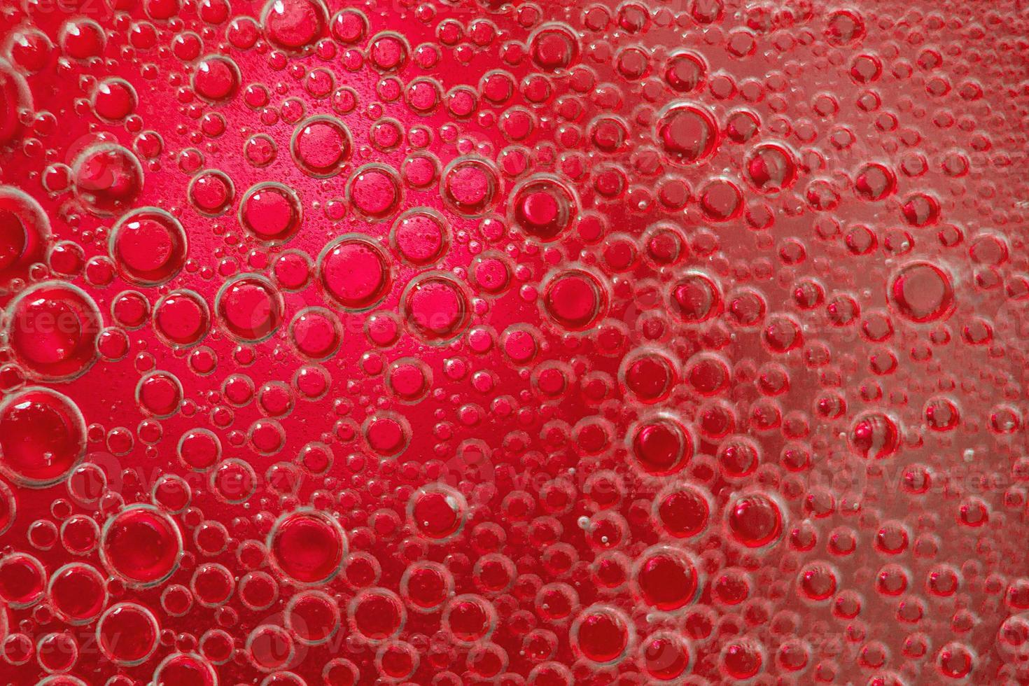abstract light blue background with oil circles . bubbles of water close up . oil bubbles in the water macro. circle bubbles background photo