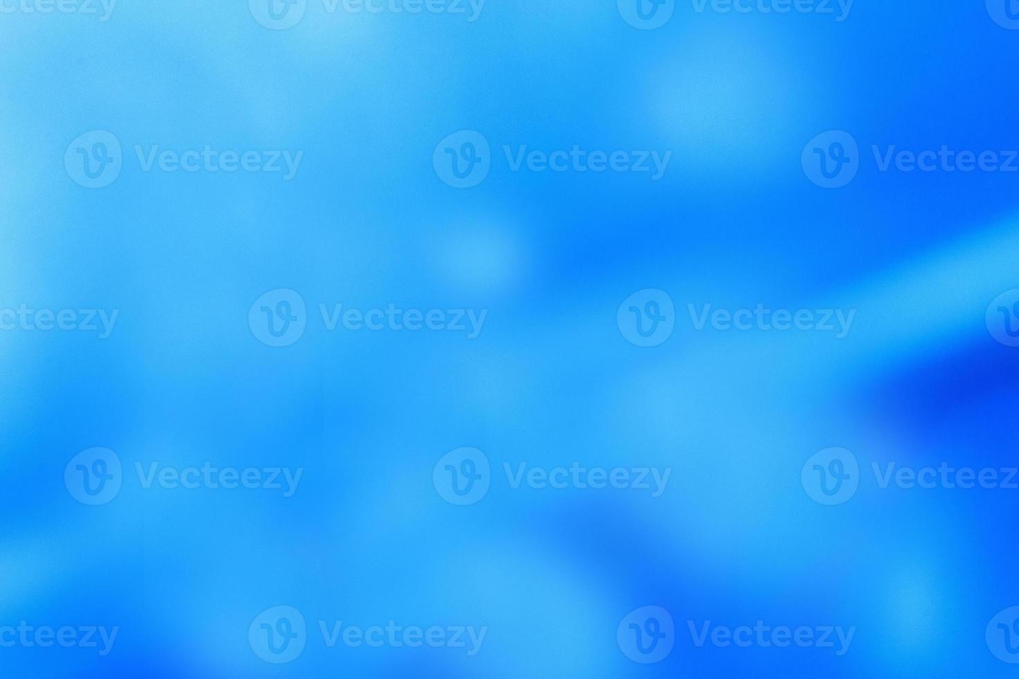 abstract light blue blurred shine background with gradient photo
