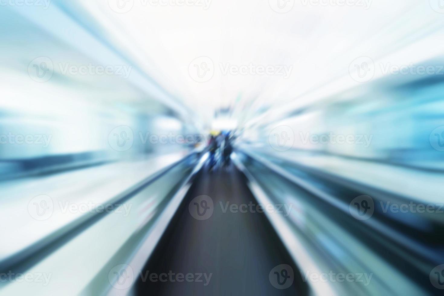 Abstract Blurred Moving Escalator in the Airport Background. photo