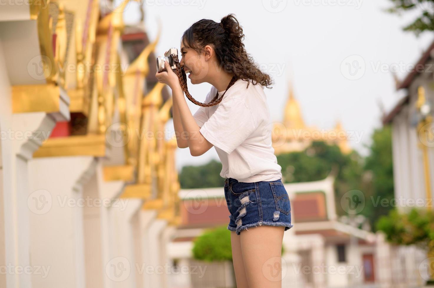 Beautiful young Asian tourist woman on vacation sightseeing and exploring Bangkok city, Thailand, Holidays and traveling concept photo