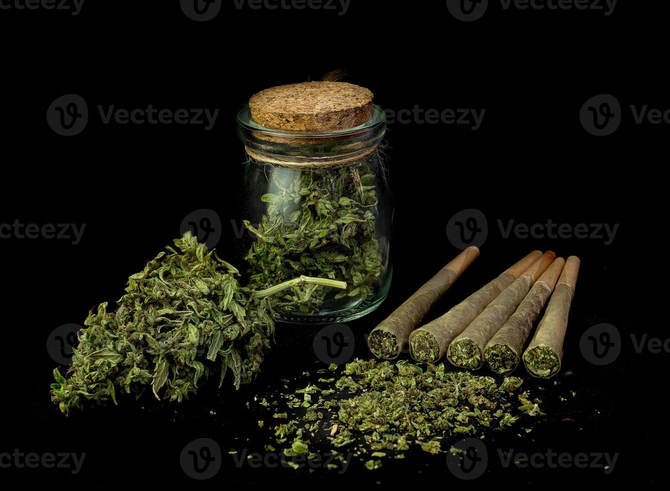 Marijuana joint pre-rolled cone paper with cannabis indica photo