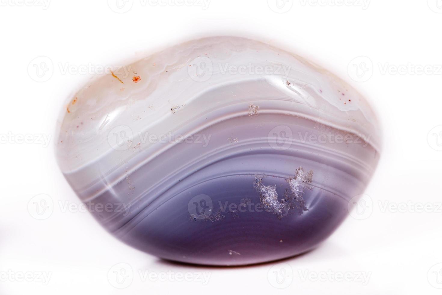 Macro mineral stone Agate Botswana gray on white background photo