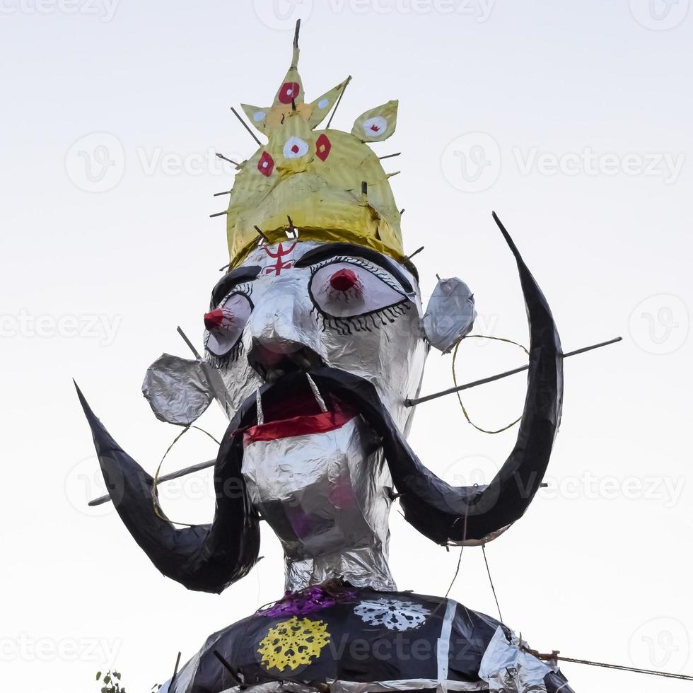 Ravnans being ignited during Dussera festival at ramleela ground in Delhi, India, Big statue of Ravana to get fire during the Fair of Dussera to celebrate the victory of truth by Lord Rama photo