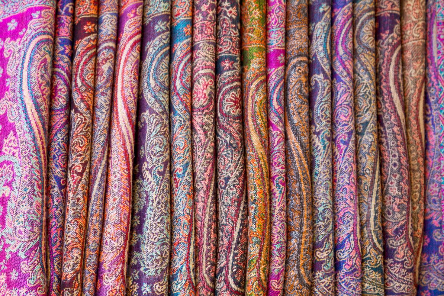 Row of elegant scarves for sale photo