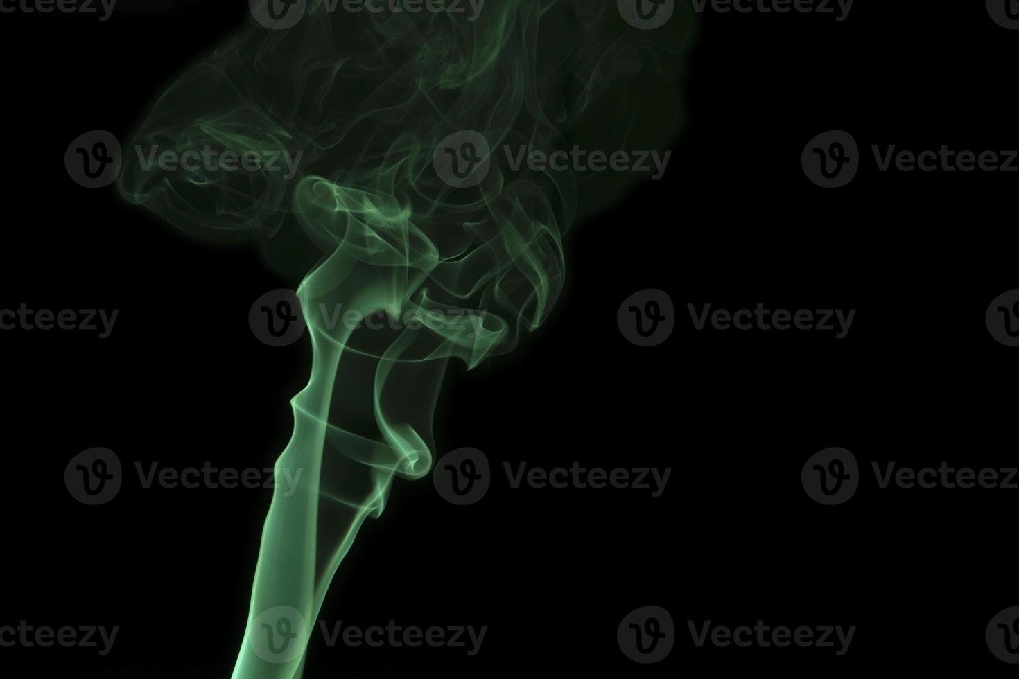 Swirling abstract green smoke photo