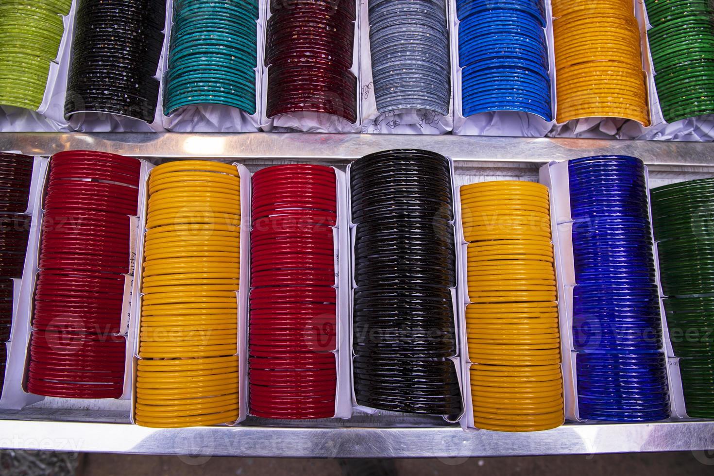 Multi-colored Glass Bangles for sale  can be used as a background texture wallpaper photo