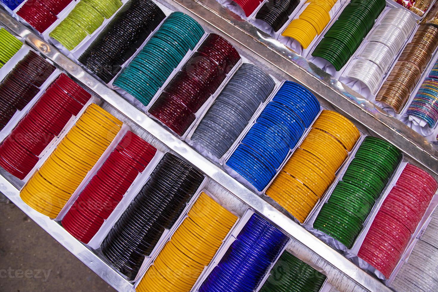 Multi-colored Glass Bangles for sale  can be used as a background texture wallpaper photo