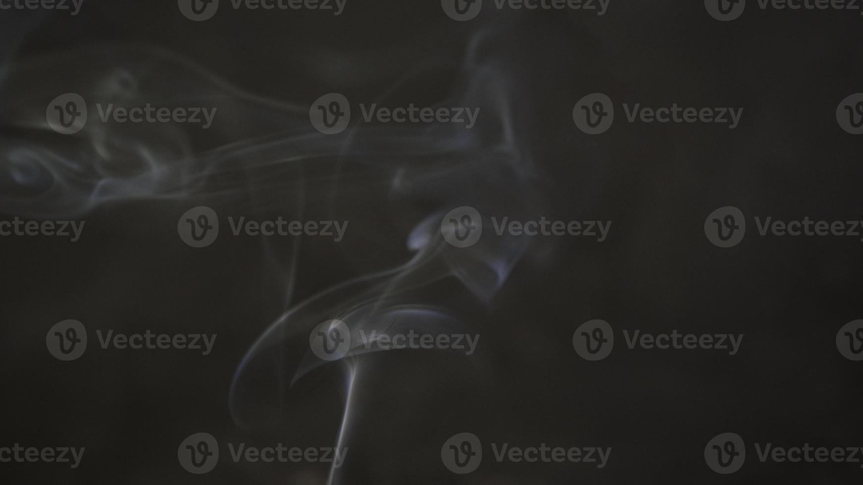 Blurred background for text or design. Blurred abstract smoke pattern. Monochrome picture. Black and white abstract design. photo