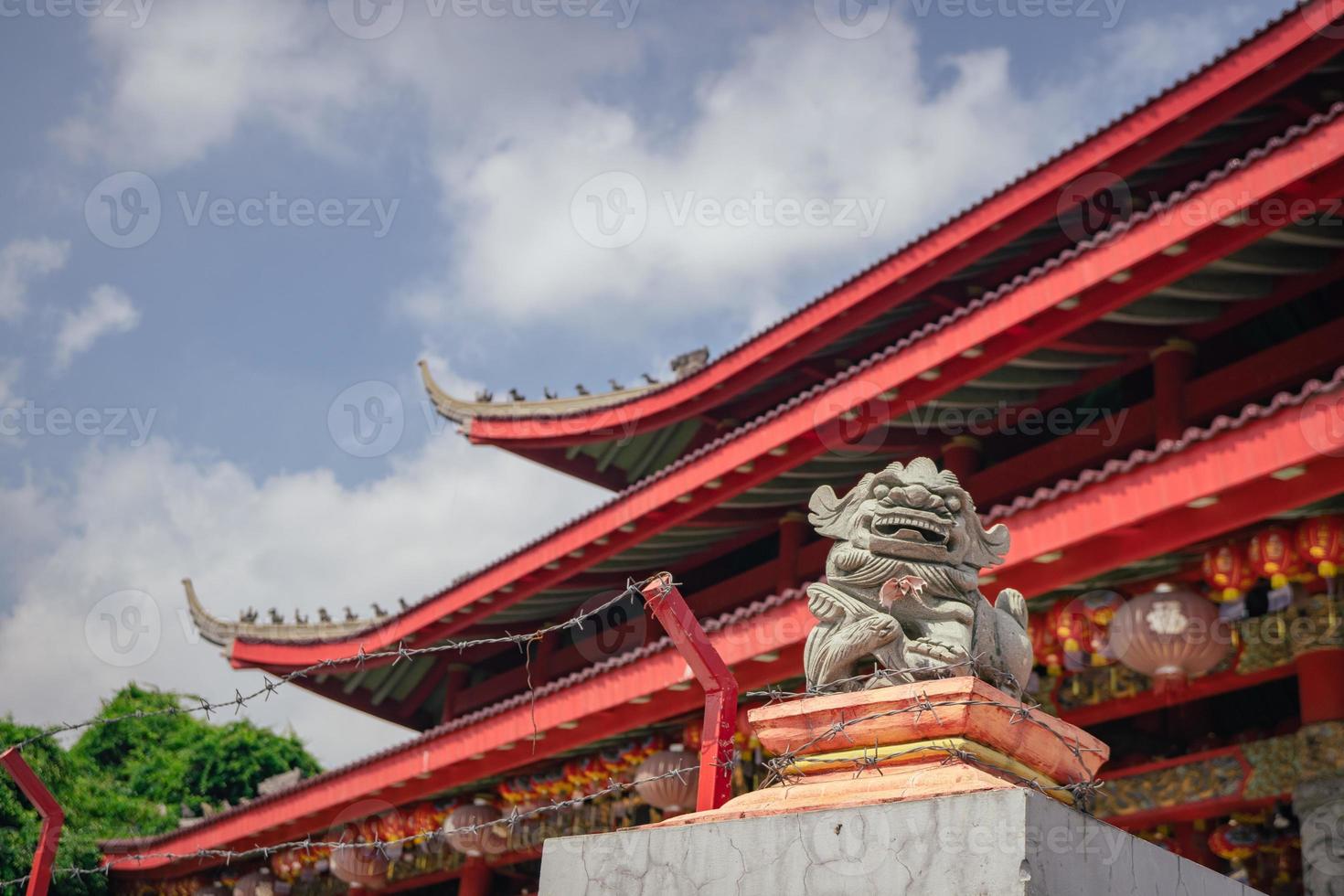 Traditional chinese guardian gate statute on the chinese temples when chinese new years. The photo is suitable to use for chinese new year, lunar new year background and content media.