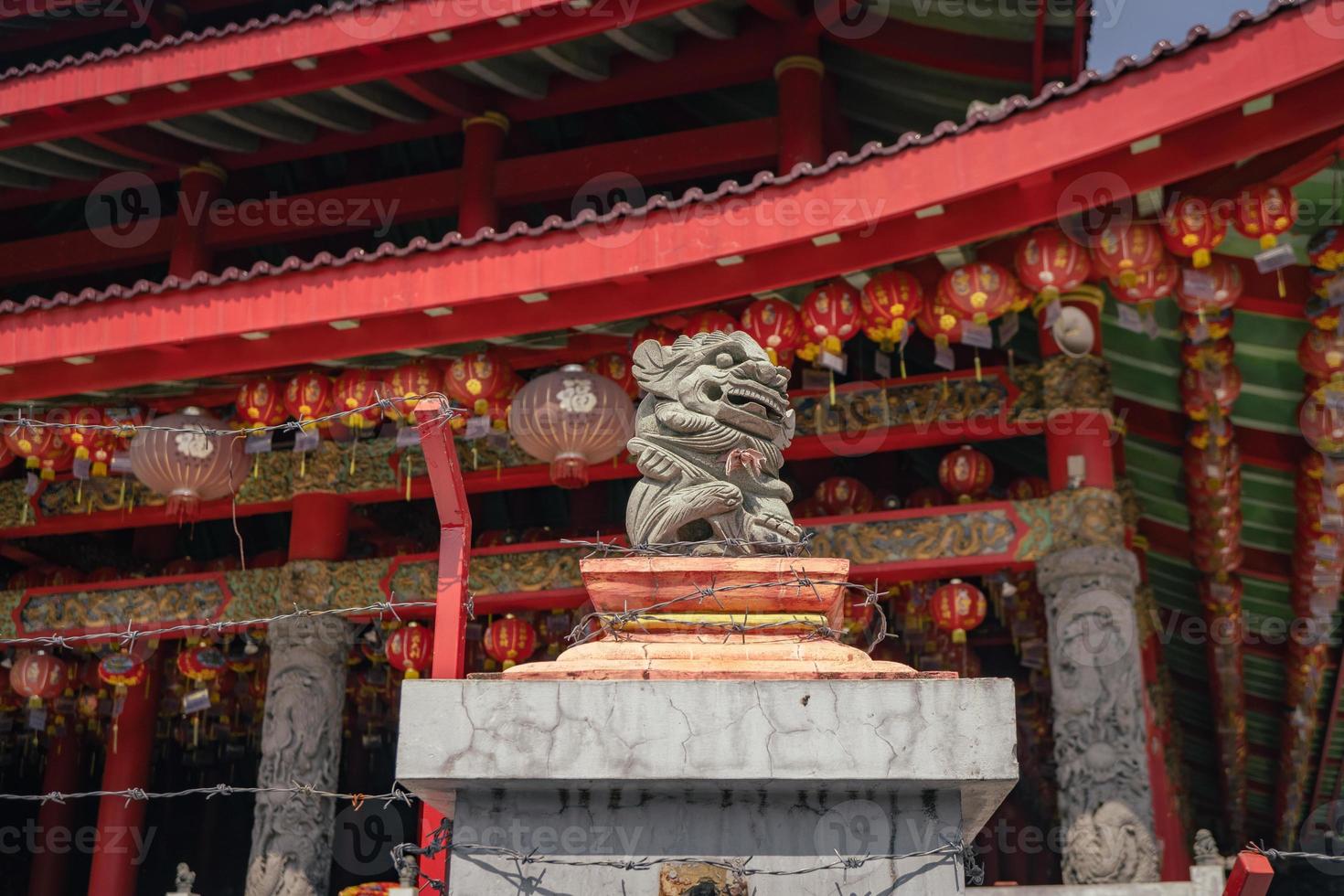 Traditional chinese guardian gate statute on the chinese temples when chinese new years. The photo is suitable to use for chinese new year, lunar new year background and content media.