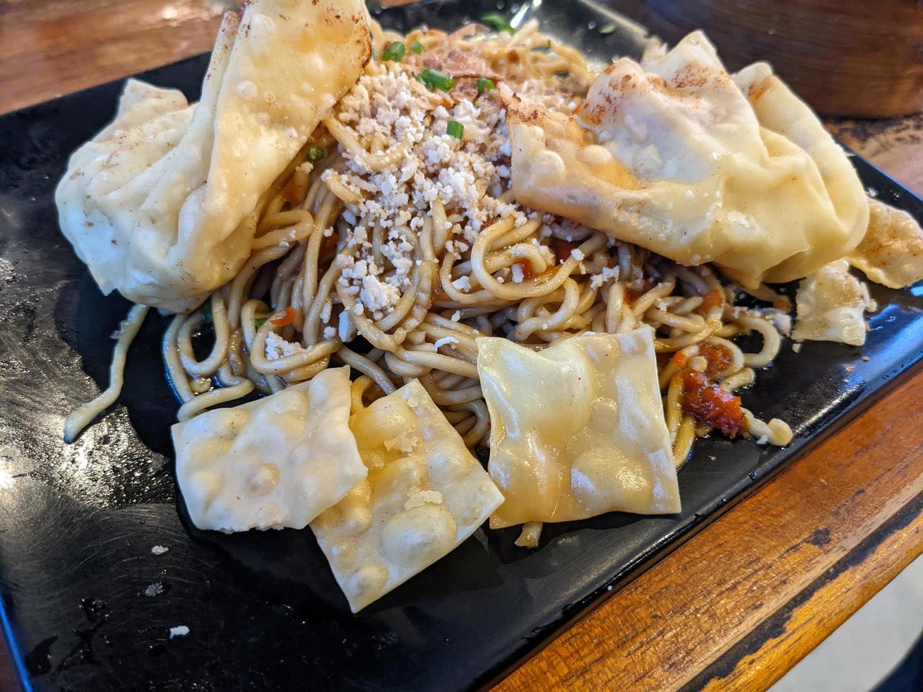 Close up photo of traditional spicy noodle from Indonesia. The photo is suitable to use for traditional food background, poster and food content.