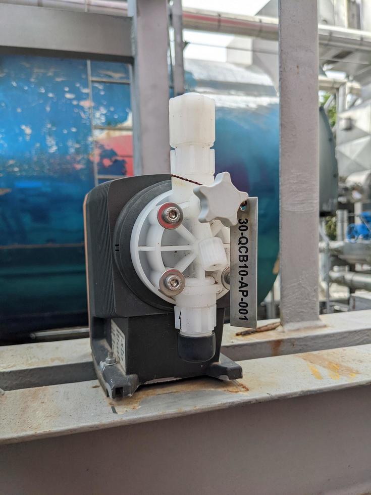 Power plant project activity for water treatment plant and checking equipment. The photo is suitable to use for industry background, construction poster and safety content media.