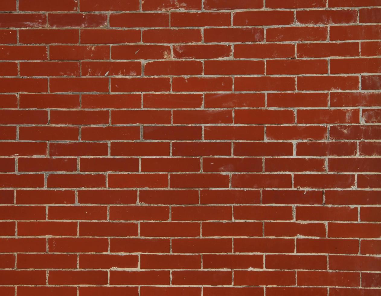 Red brick textured walls background photo exterior isolated on landscape template. Empty copy space wallpaper for social media post, poster, brochure, and other purpose.