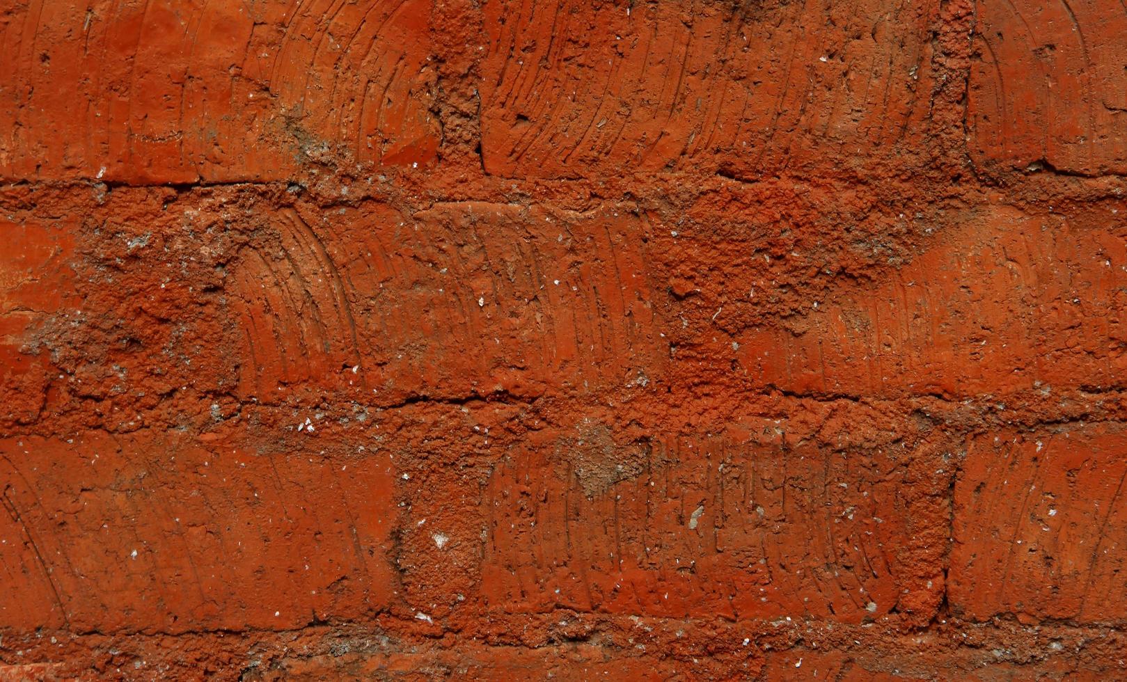 Red brick textured walls background photo exterior isolated on landscape template. Empty copy space wallpaper for social media post, poster, brochure, and other purpose.