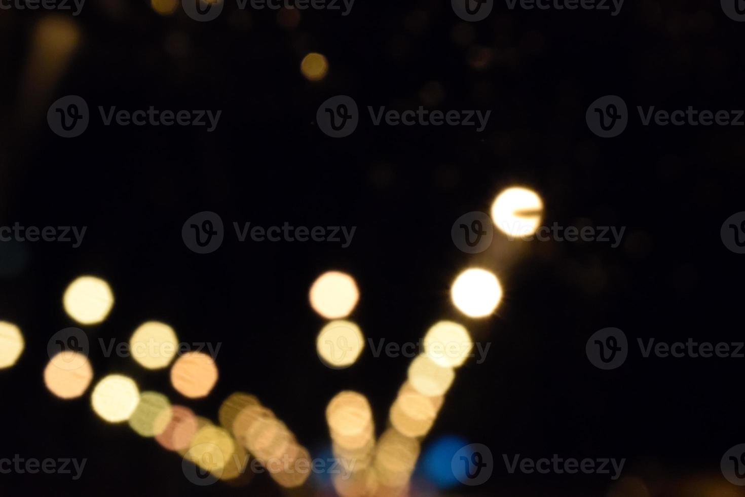 Bokeh lights of night lights on a dark background. photo
