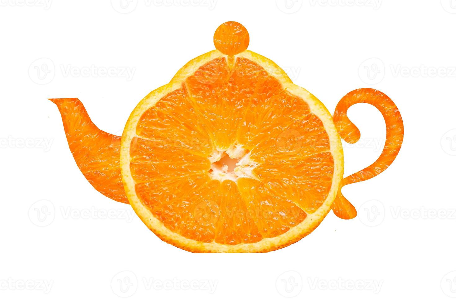 Kettle made of orange on a white background. Orange tea photo