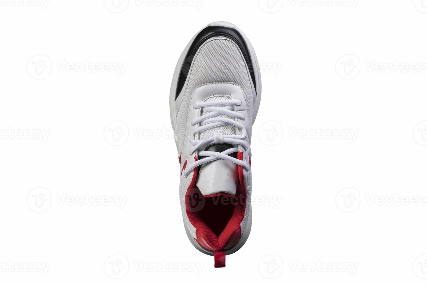 White sneaker with red and black accents top view. Sport shoes. photo