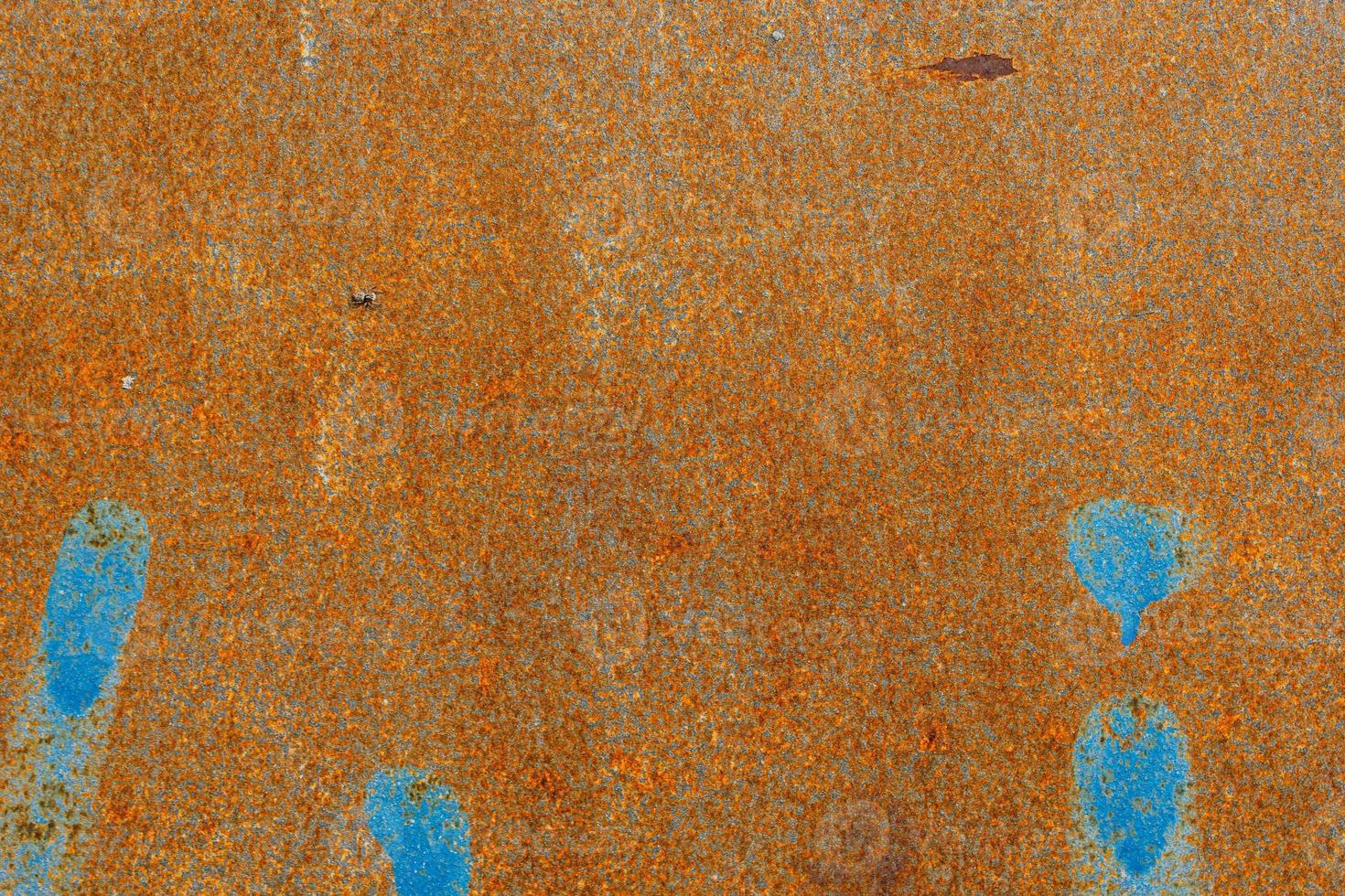 rusty background with blue elements in close-up photo