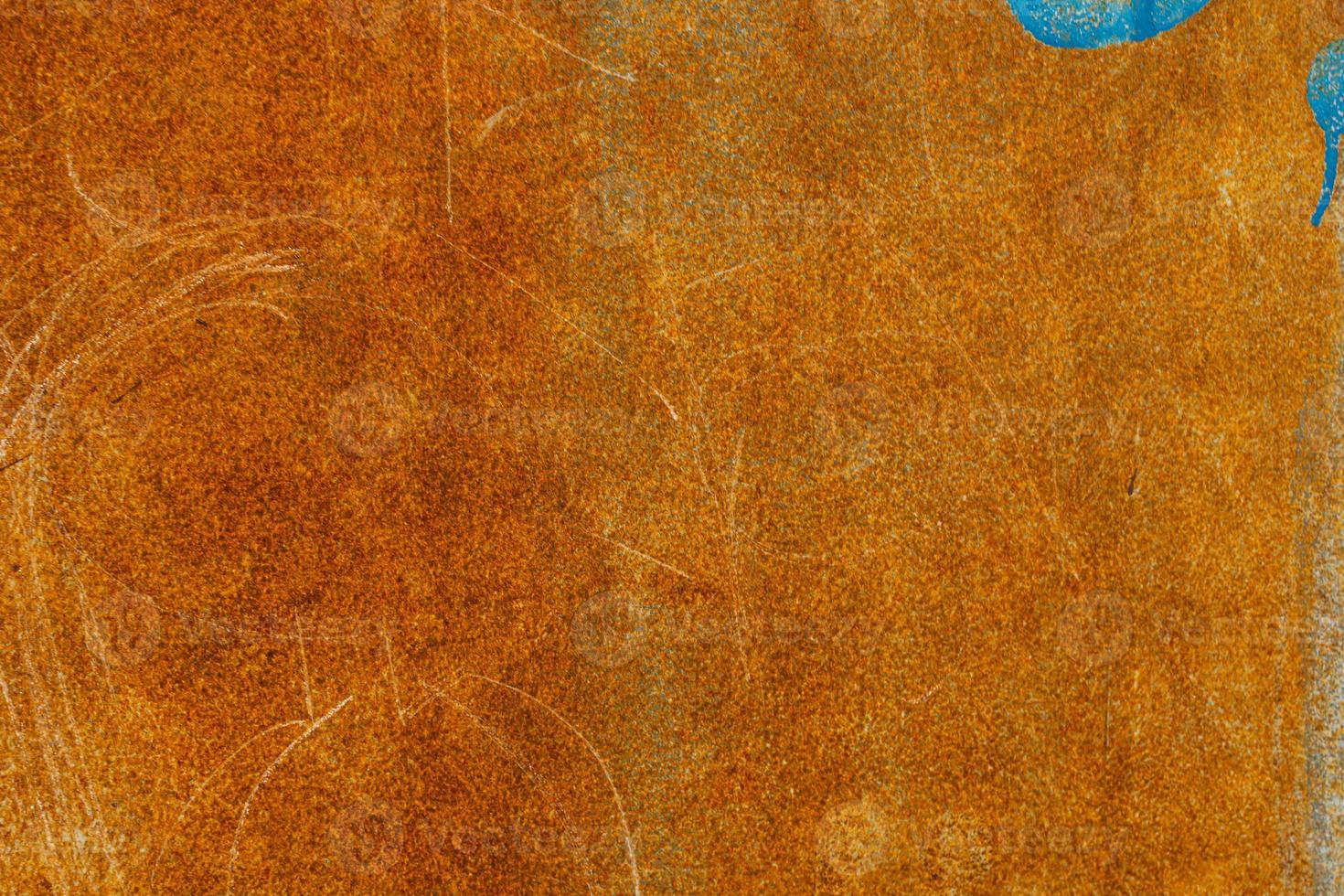 rusty background with blue elements in close-up photo
