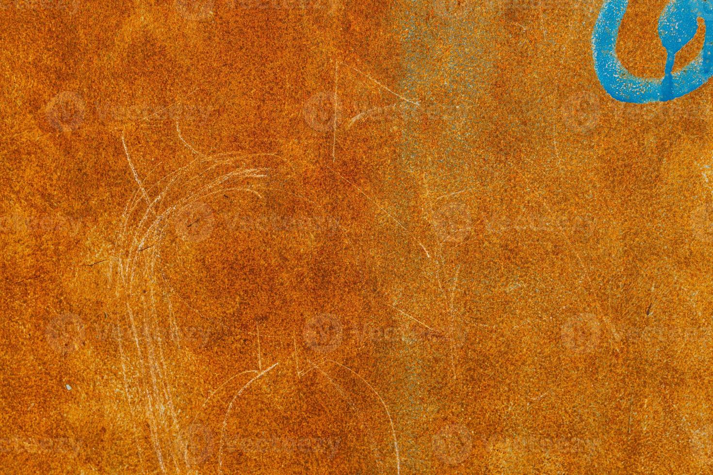 rusty background with blue elements in close-up photo