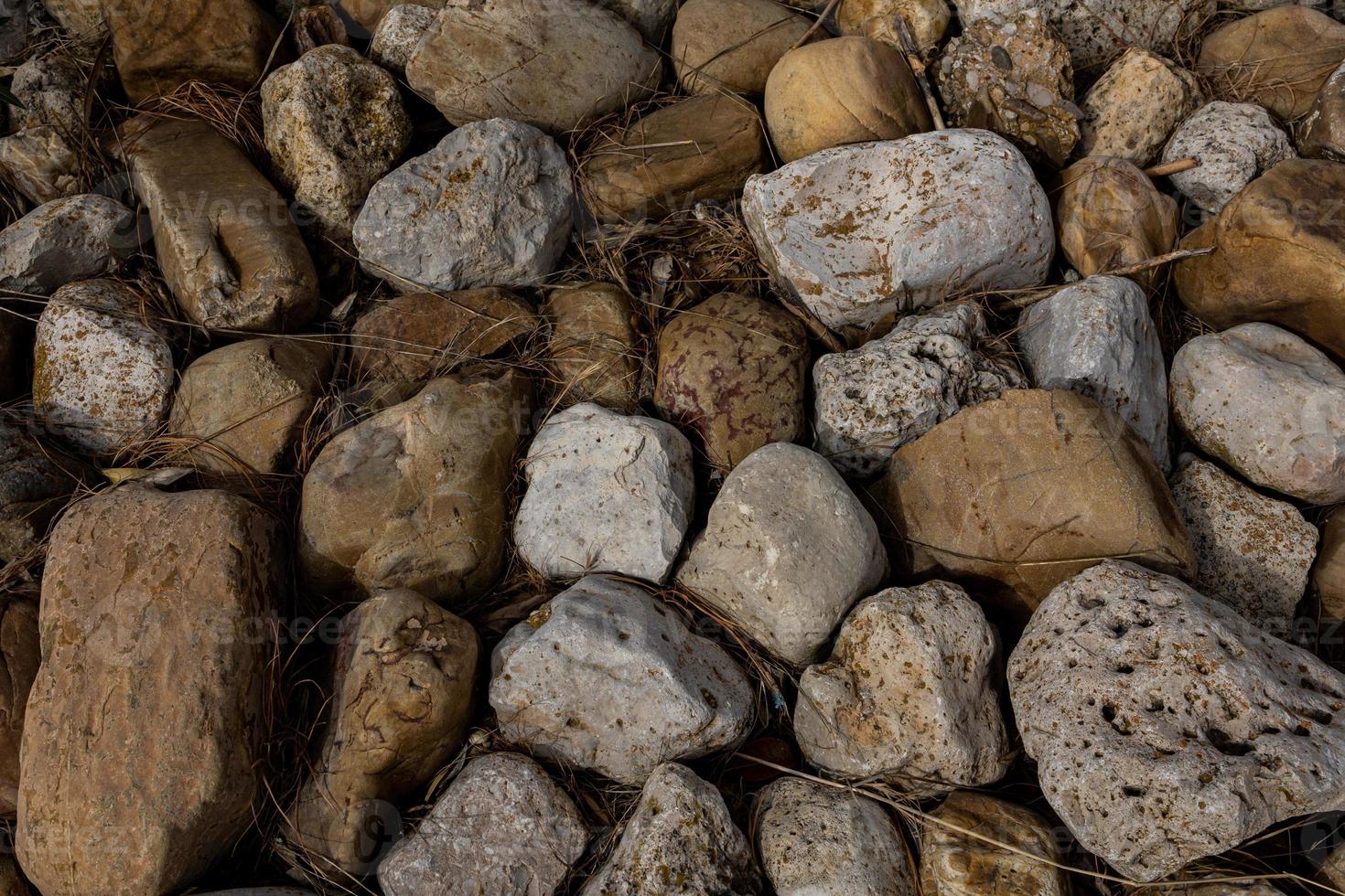 gray abstract natural stone boulder background photo