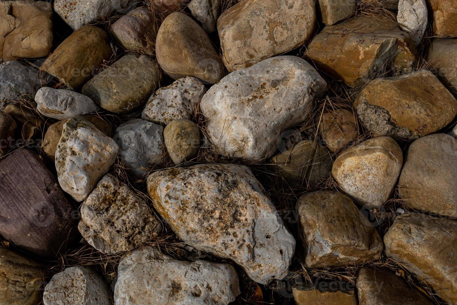 gray abstract natural stone boulder background photo