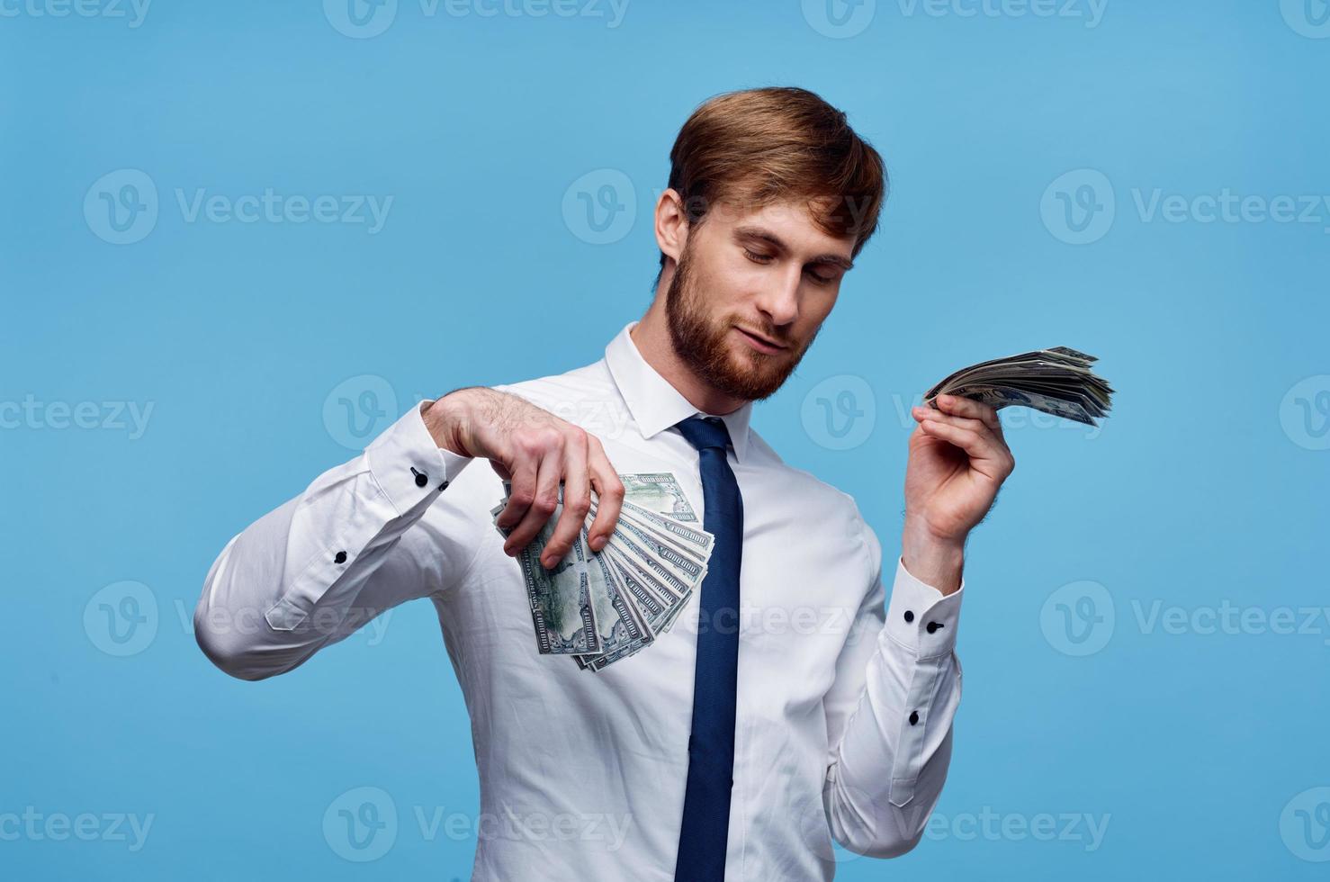 business man wads of money self confidence financial lifestyle photo