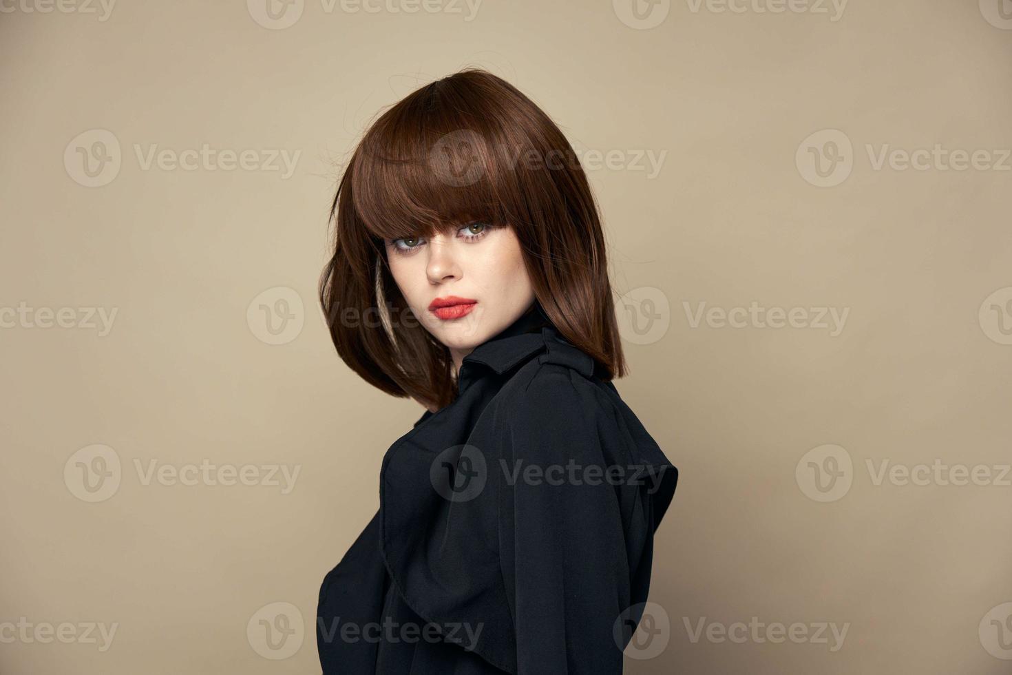 Pretty model stylish clothes bright makeup posing studio photo