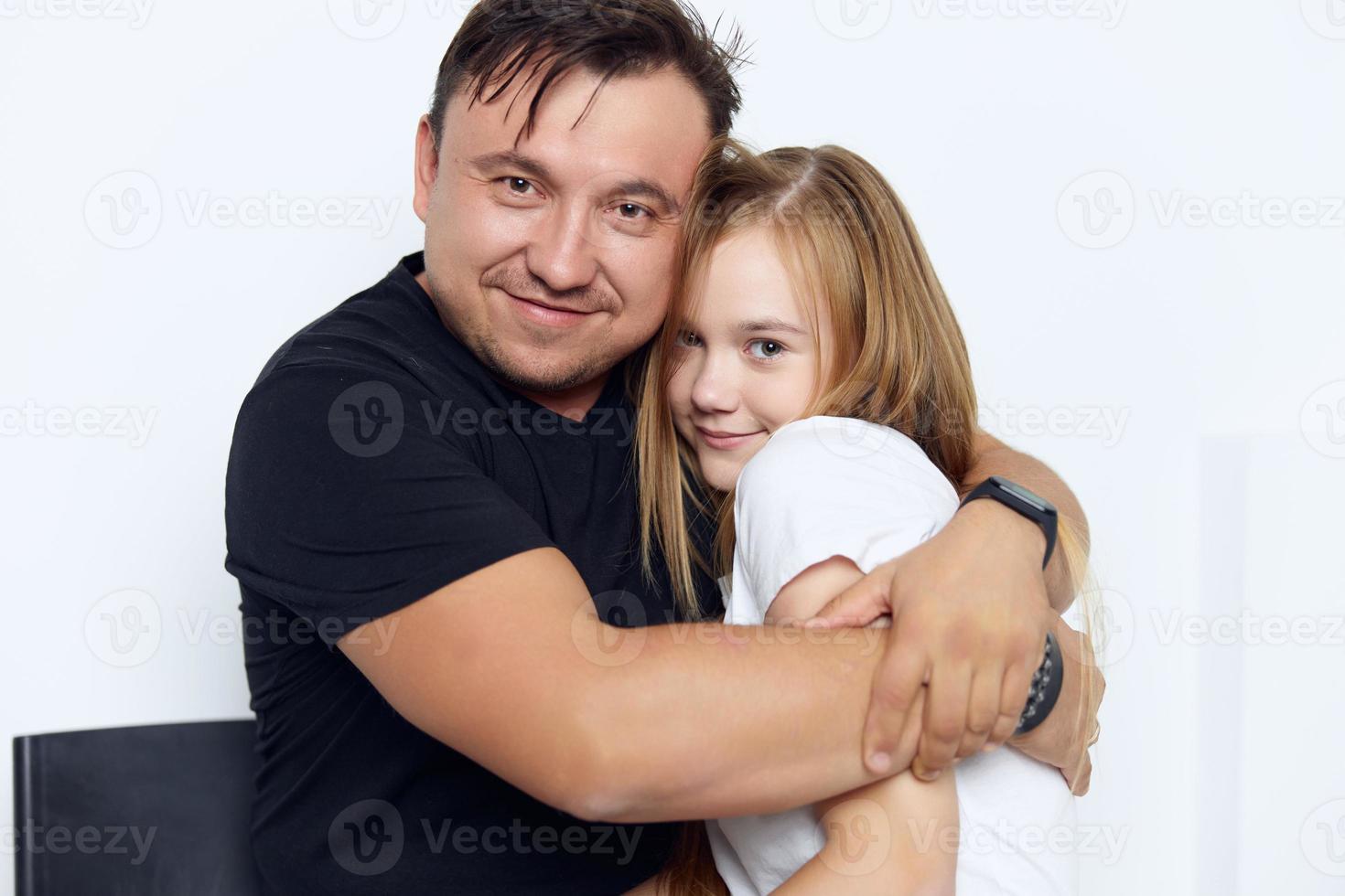 father and daughter hug family lifestyle studio photo