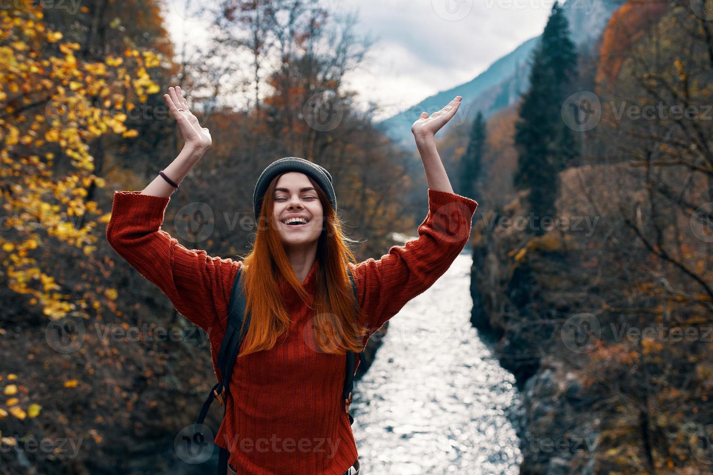 cheerful woman tourist freedom mountains travel river photo