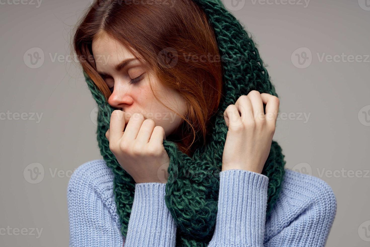 sick woman green scarf on the head isolated background photo